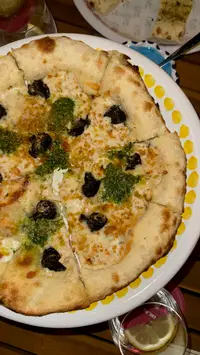 Handmade pizza at Osteria